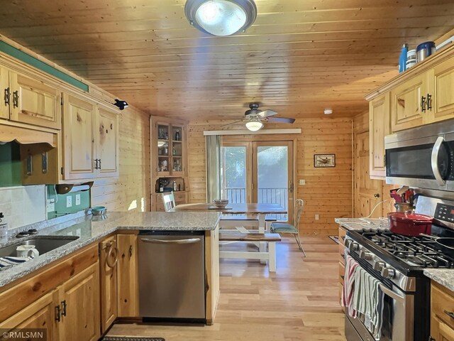 kitchen with wooden ceiling, stainless steel appliances, light wood-type flooring, and a peninsula