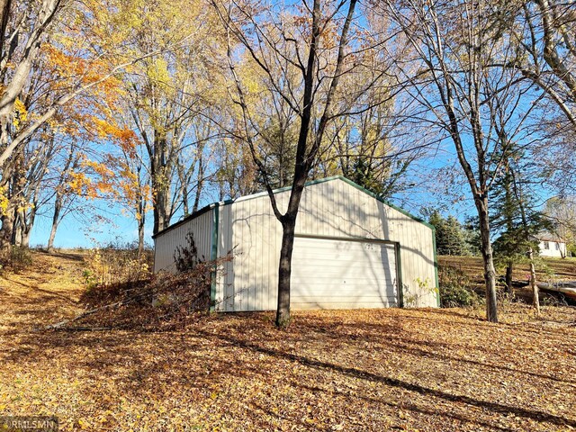 view of outbuilding featuring an outdoor structure