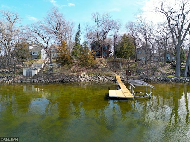 view of dock with a water view