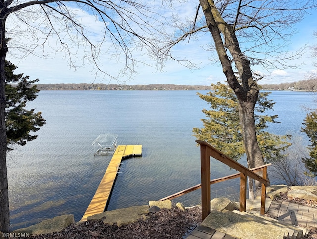 dock area featuring a water view