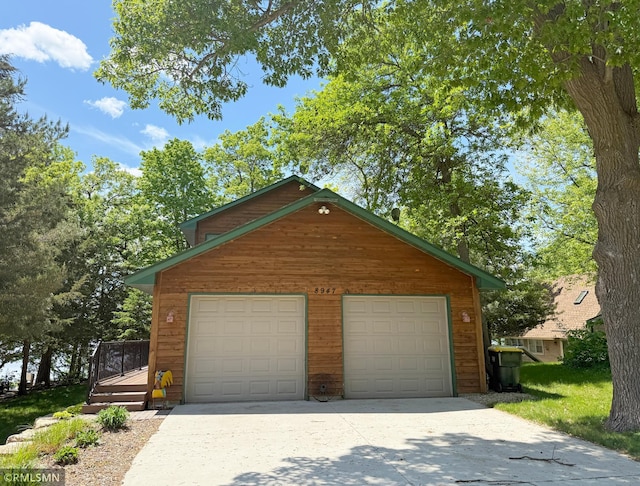 8947 Ingram Ave NW, Annandale, MN 55302 - garage with concrete driveway