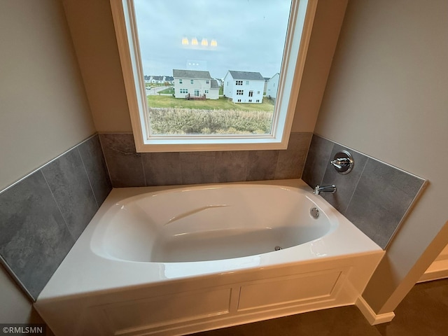 bathroom with a washtub