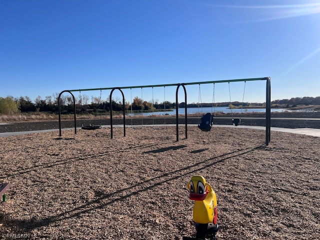 view of home's community featuring a playground