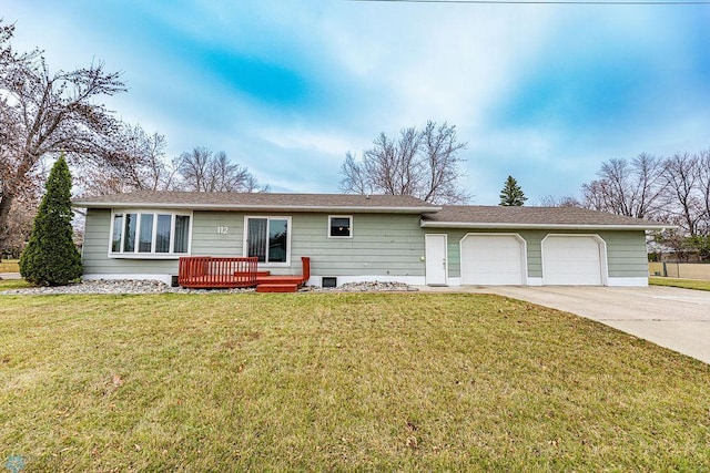 single story home featuring a front yard and a garage