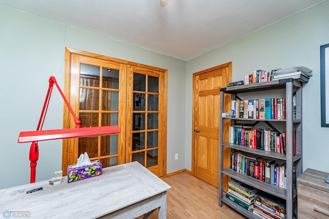 office with hardwood / wood-style floors