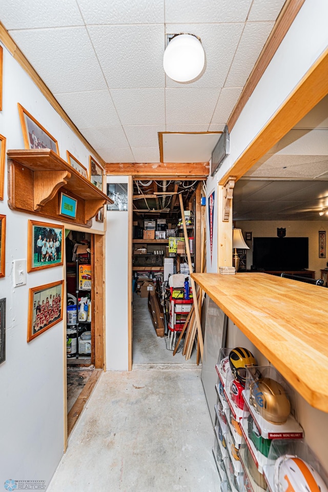 basement featuring crown molding