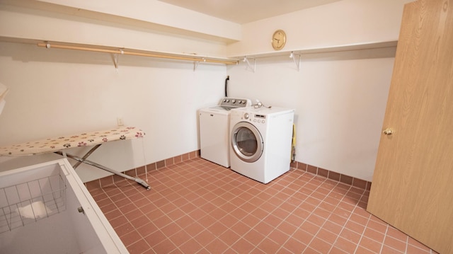 washroom featuring washer and dryer