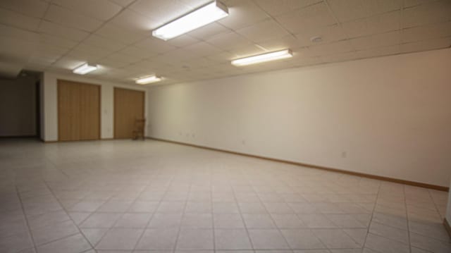 empty room with a paneled ceiling