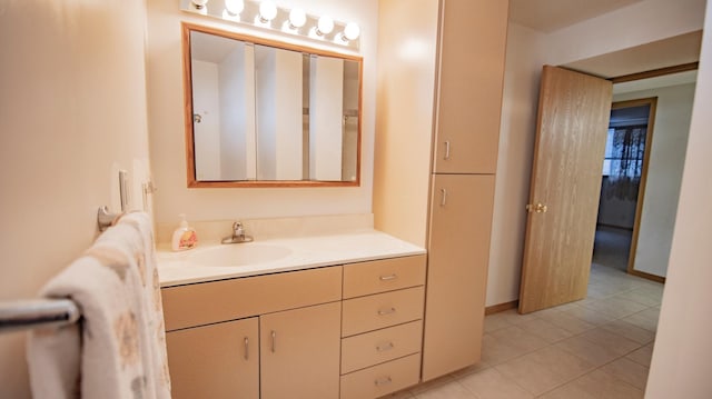 bathroom with vanity and tile patterned floors