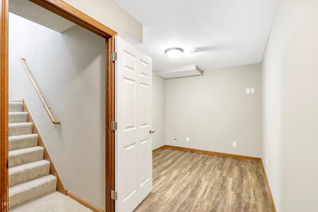 basement featuring light hardwood / wood-style floors