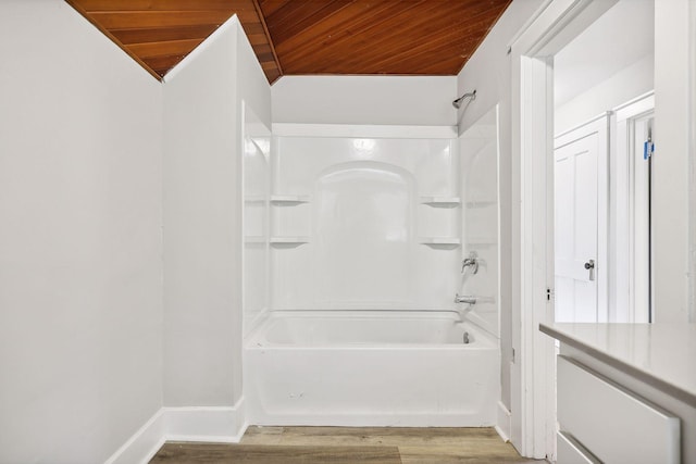 full bathroom featuring wooden ceiling, shower / tub combination, baseboards, and wood finished floors