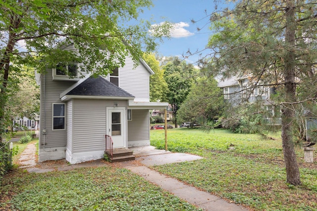 view of yard with entry steps