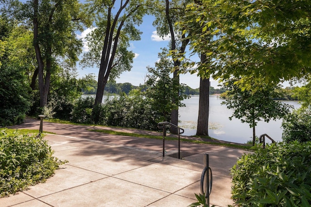 view of home's community featuring a water view