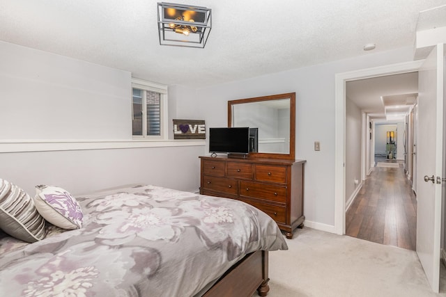 bedroom featuring light colored carpet