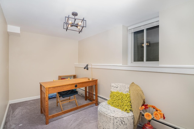 office space with carpet, a notable chandelier, and a baseboard heating unit