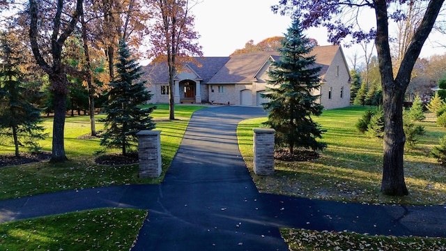 view of front of property with a front lawn