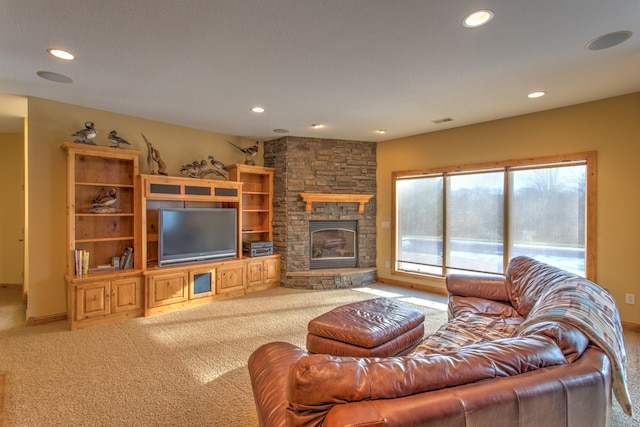 carpeted living room with a fireplace