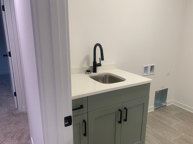 interior space with vanity and baseboards
