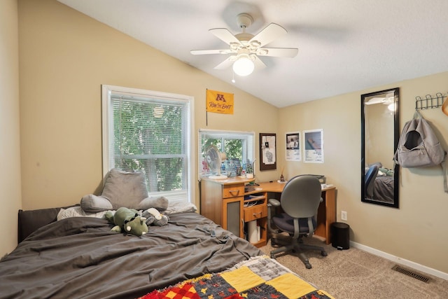 bedroom with ceiling fan, light carpet, and lofted ceiling