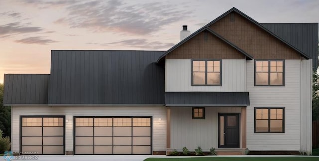 view of front of home with a garage