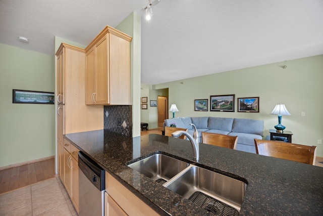 630 Main St N Unit 202, Stillwater, MN 55082 - kitchen with light brown cabinets, dishwasher, a sink, dark stone countertops, and open floor plan