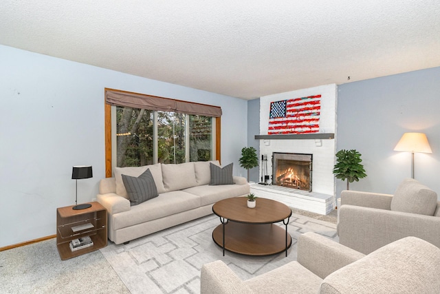 living room featuring a textured ceiling, carpet, and a fireplace