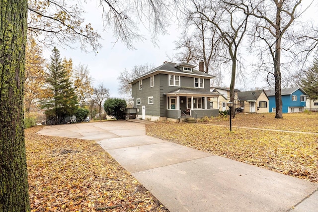 view of front property featuring covered porch