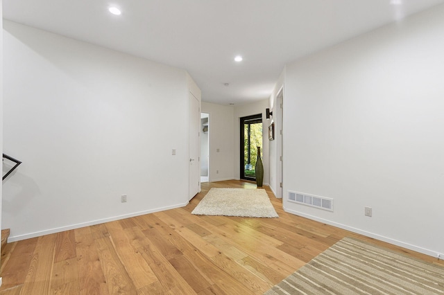 entryway with light hardwood / wood-style floors