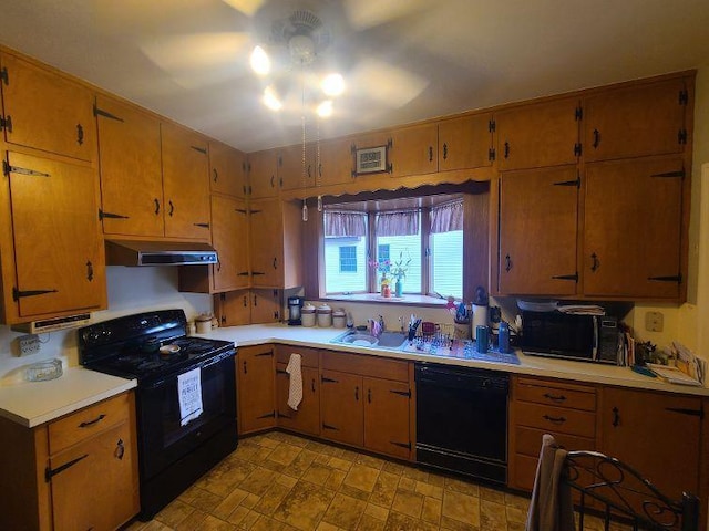 kitchen featuring sink and black appliances