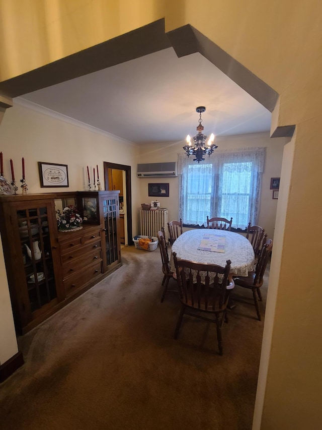 dining space with carpet, ornamental molding, a wall mounted AC, a chandelier, and radiator heating unit