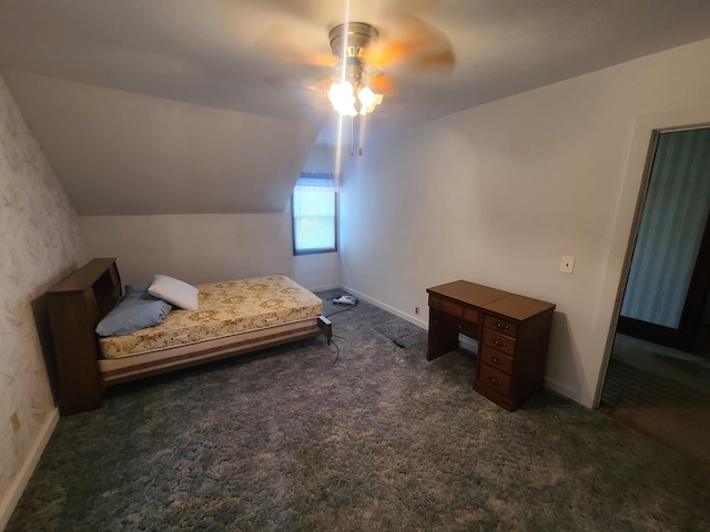 carpeted bedroom featuring vaulted ceiling and ceiling fan