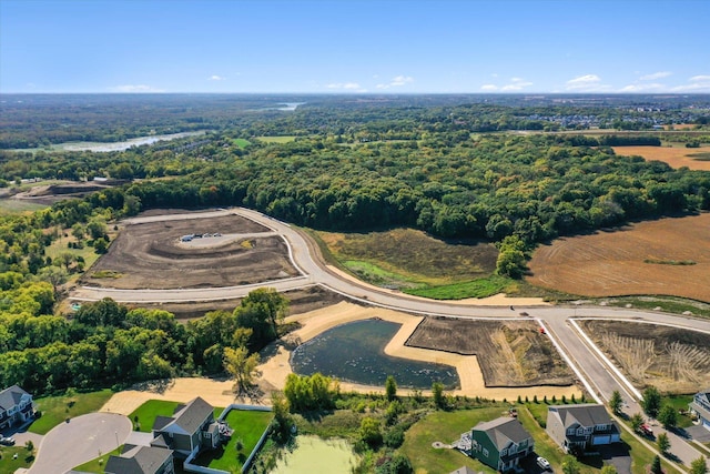 aerial view with a wooded view