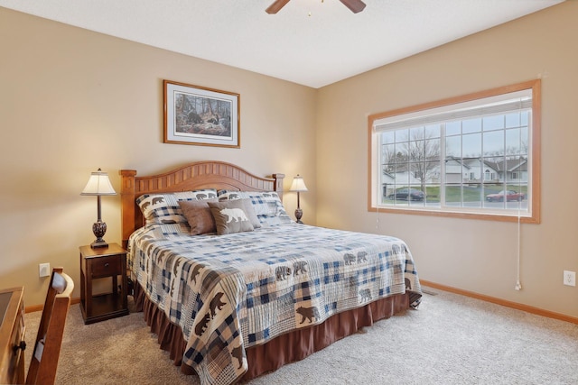 bedroom with light carpet and ceiling fan