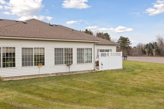 view of property exterior featuring a yard