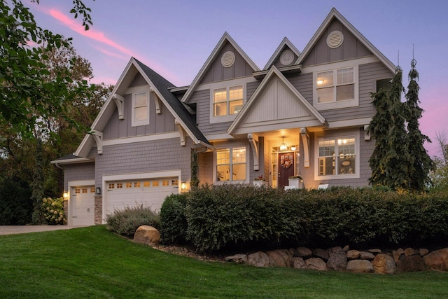 21360 Christmas Ln, Shorewood, MN 55331 - craftsman-style house featuring board and batten siding, a front lawn, and driveway
