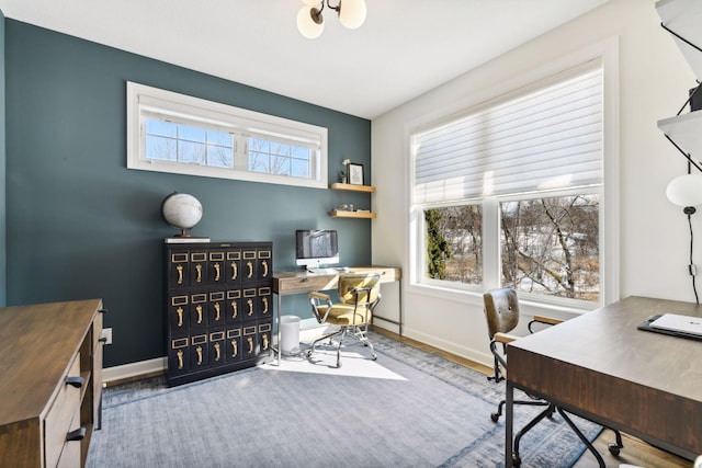 21360 Christmas Ln, Shorewood, MN 55331 - office area featuring baseboards and wood finished floors