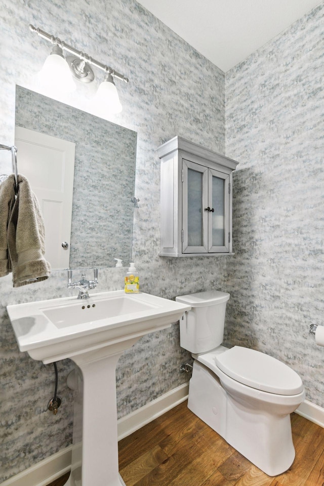 21360 Christmas Ln, Shorewood, MN 55331 - bathroom with toilet, wood finished floors, and a sink