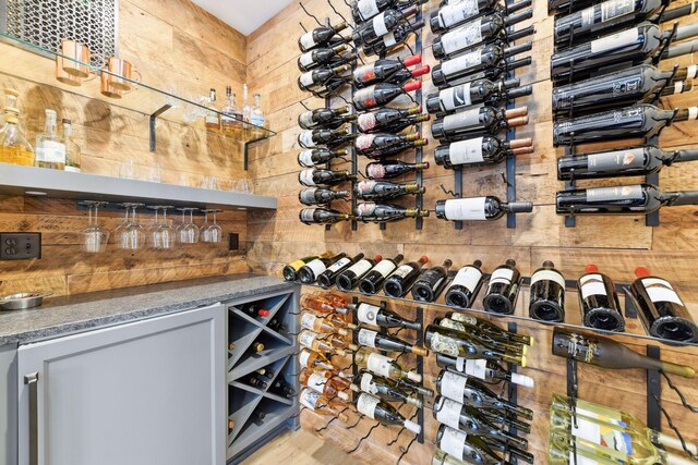 21360 Christmas Ln, Shorewood, MN 55331 - wine room with wood finished floors and wood walls