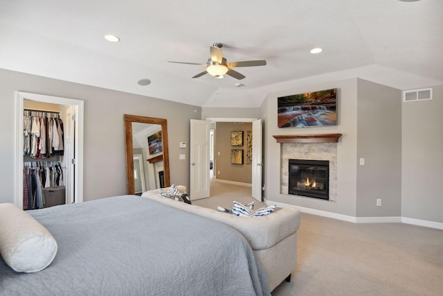 21360 Christmas Ln, Shorewood, MN 55331 - bedroom with visible vents, baseboards, light colored carpet, and a glass covered fireplace