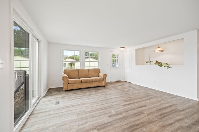 living room with light wood-type flooring