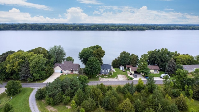 bird's eye view with a residential view and a water view