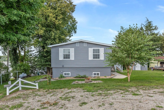 view of property exterior featuring a lawn