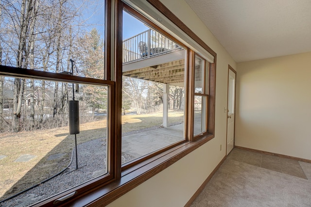 unfurnished sunroom with a healthy amount of sunlight