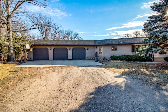 single story home featuring a garage