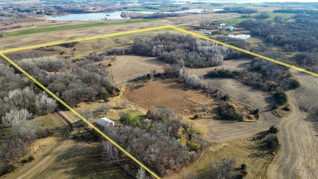 aerial view with a water view and a rural view