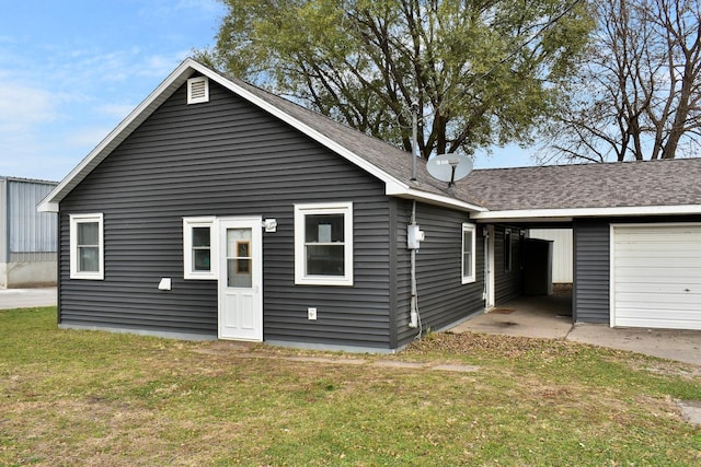 rear view of property with a yard