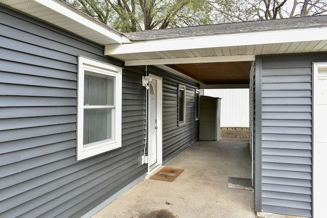 exterior space featuring a carport