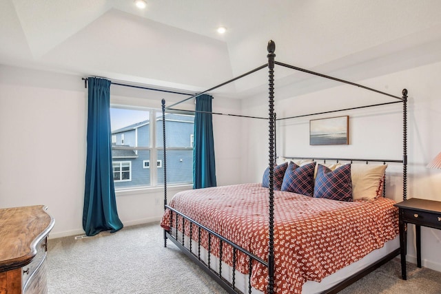 carpeted bedroom featuring recessed lighting, vaulted ceiling, and baseboards