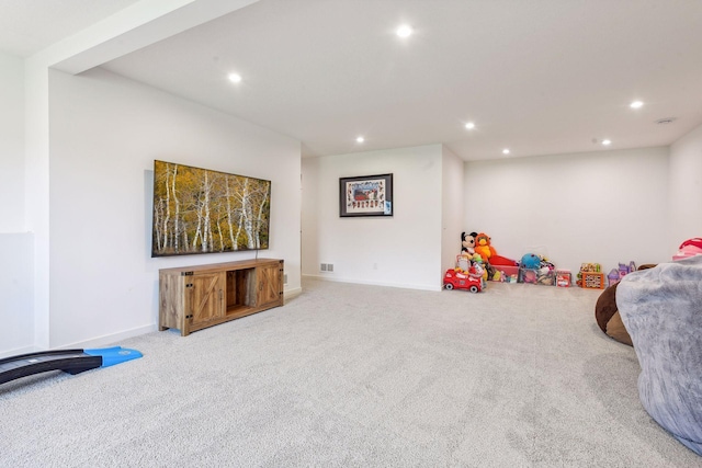 rec room with recessed lighting, baseboards, visible vents, and carpet