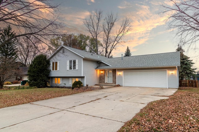 split level home featuring a garage